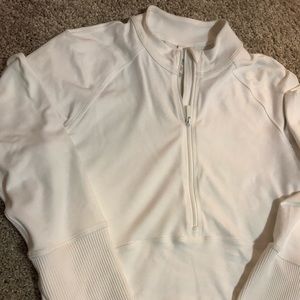Size 4 Lululemon crop jacket. Never worn